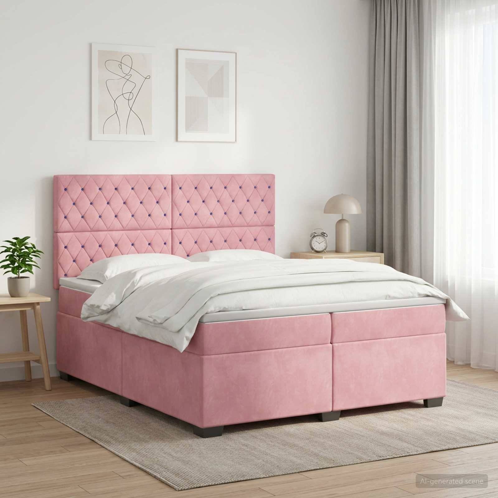 Rosa gepolstertes Bett mit gestepptem Kopfteil in einem hellen modernen Schlafzimmer, ausgestattet mit weißer Bettwäsche, Nachttischen und gerahmten Wandkunstwerken.