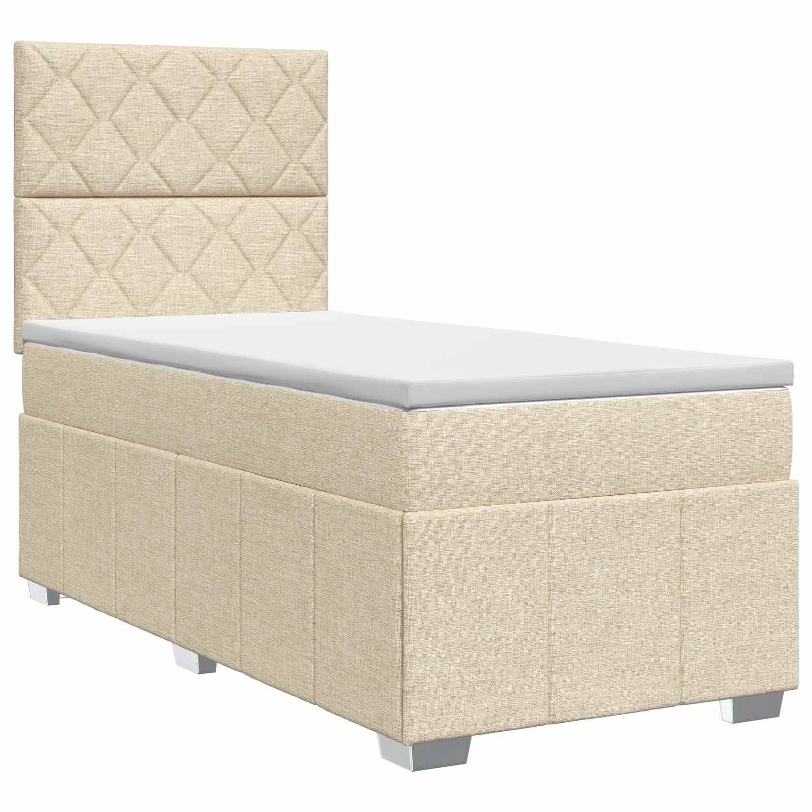 Beige gepolstertes Einzelbett mit gepolstertem, rautengestepptem Kopfteil und einfacher Matratze auf weißem Hintergrund.