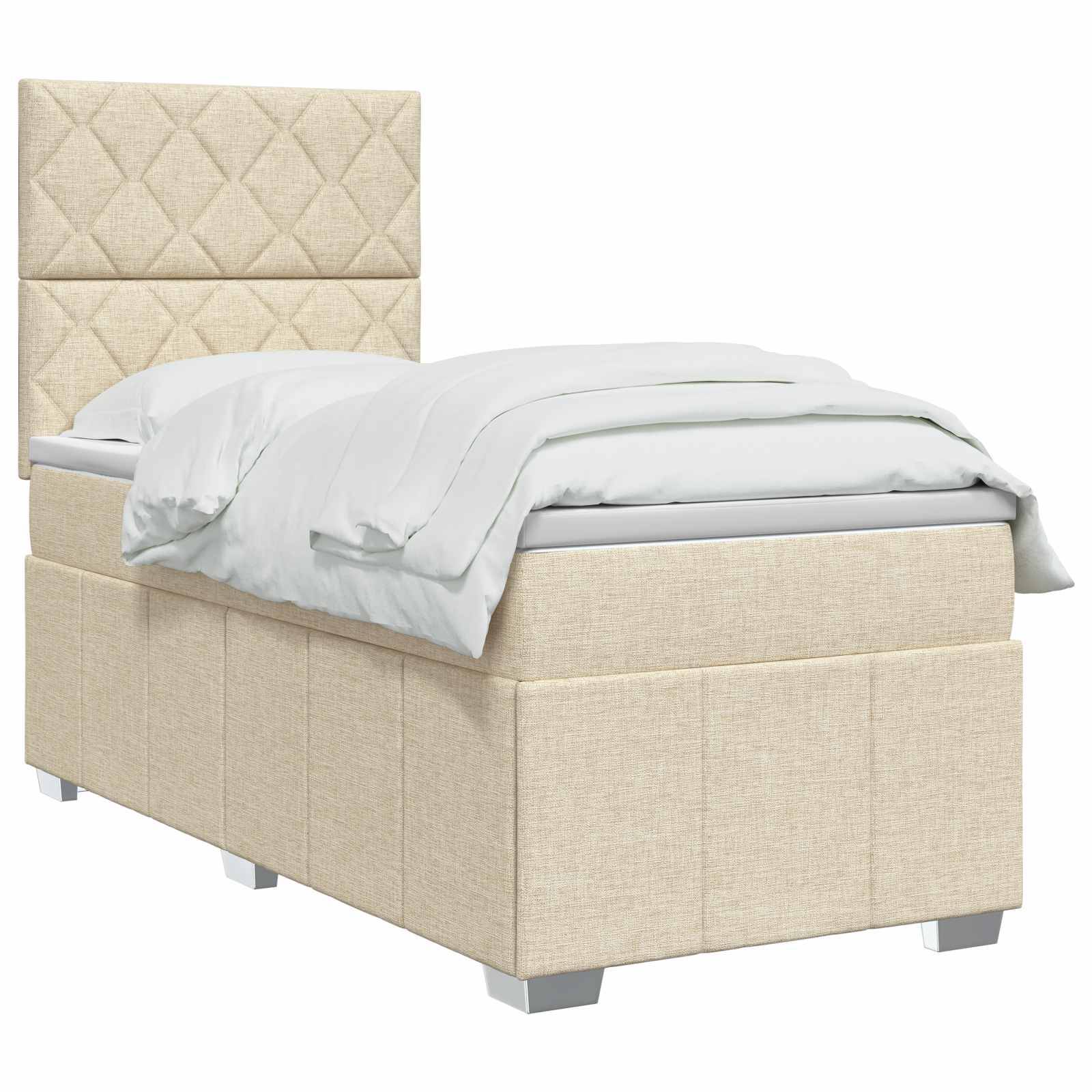 Beiges Einzelbett mit gestepptem Kopfteil und weißer Bettwäsche auf einfachem weißem Hintergrund.