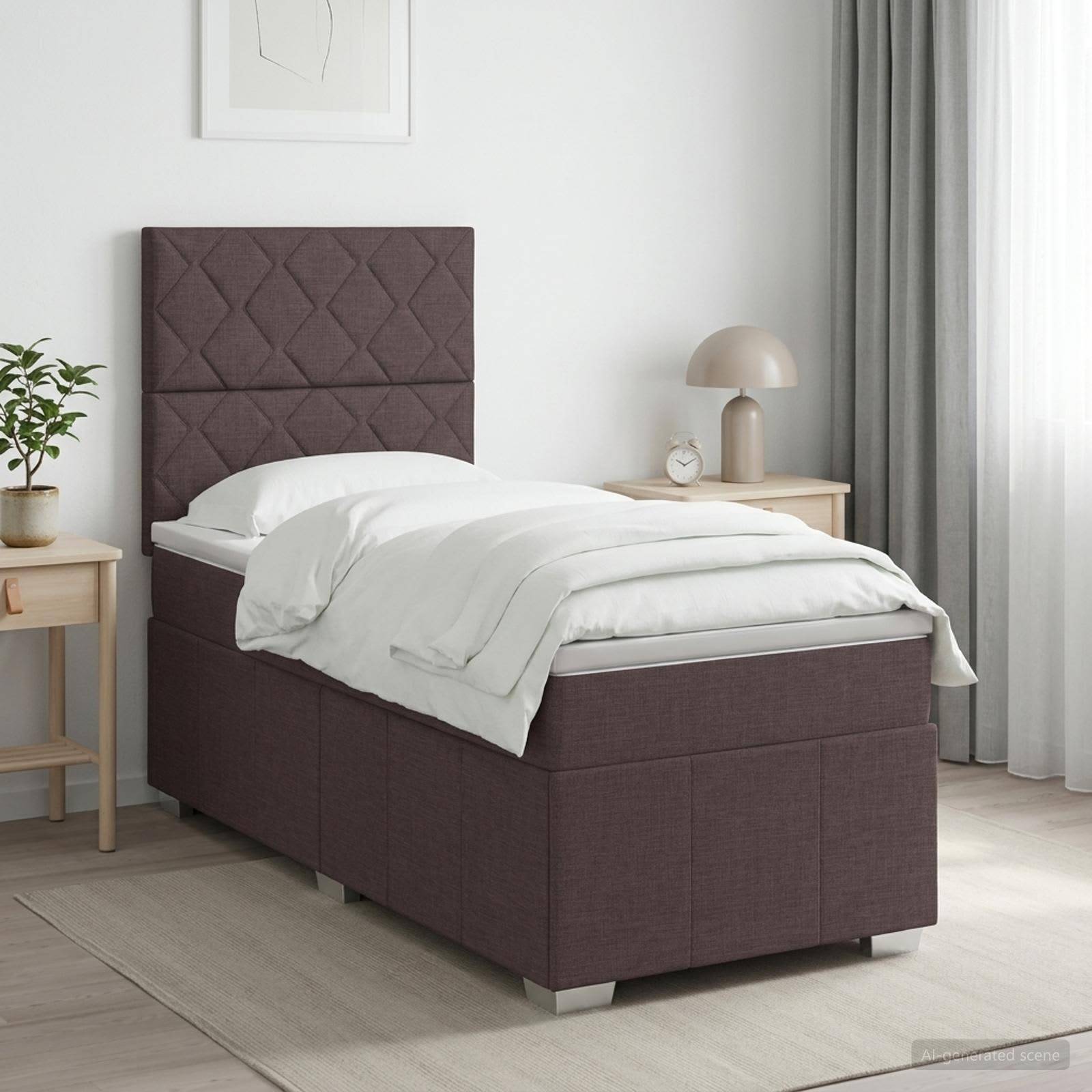 Einzelnes gepolstertes Bett mit hohem gestepptem Kopfteil, weißer Bettwäsche und passendem Stauraumbettrahmen in einem minimalistischen Schlafzimmer