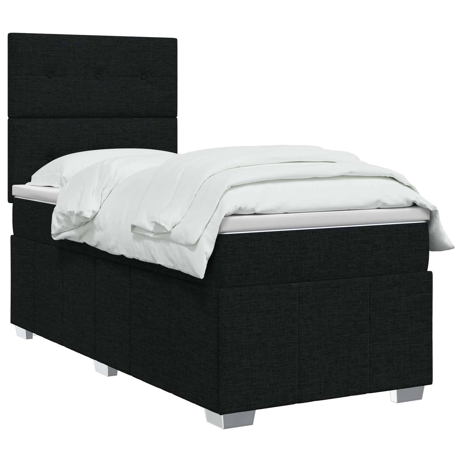 Schwarzes gepolstertes Einzelbett mit hohem Kopfteil und weißer Bettwäsche auf einfachem weißem Hintergrund.