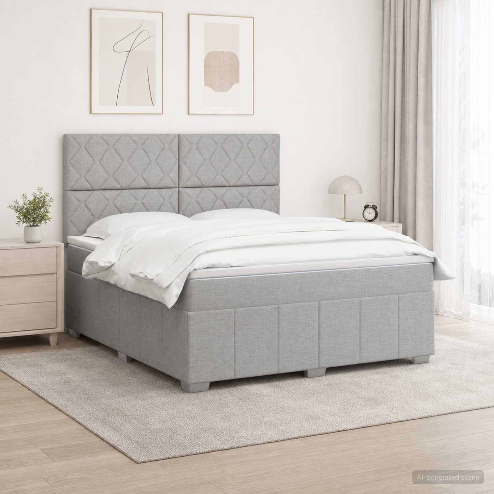 Modernes Schlafzimmer mit einem grau gepolsterten Bett, weißer Bettwäsche, Nachttisch, Lampe, Pflanze und rahmentem Wandkunstwerk in einem hellen, minimalistischen Raum.