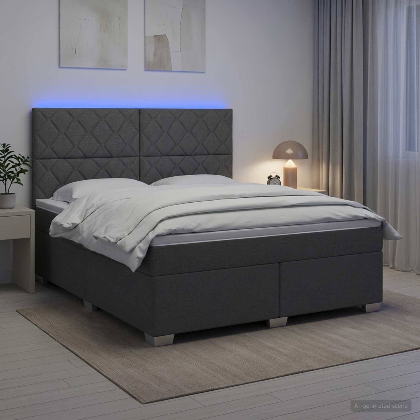 Modernes graupolstertes Bett mit gestepptem Kopfteil, weißer Bettwäsche und sanfter blauer Hintergrundbeleuchtung in einem minimalistischen Schlafzimmer.