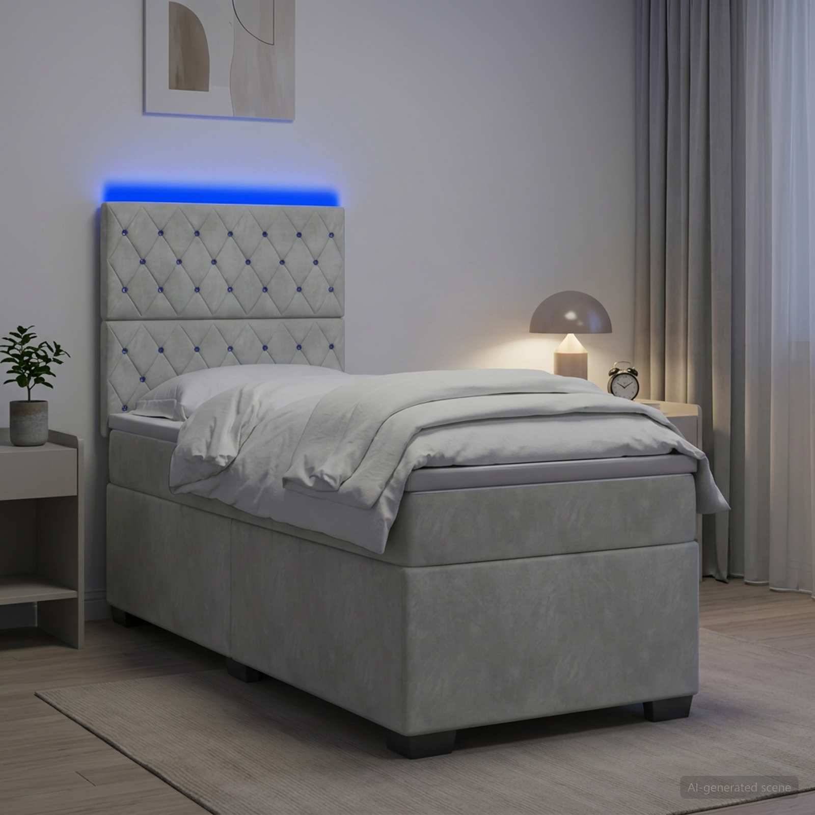 Modernes Einzelbett mit gestepptem Kopfteil und blauer LED-Akzentbeleuchtung in einem minimalistischen Schlafzimmer, mit Nachttisch und Lampe daneben.