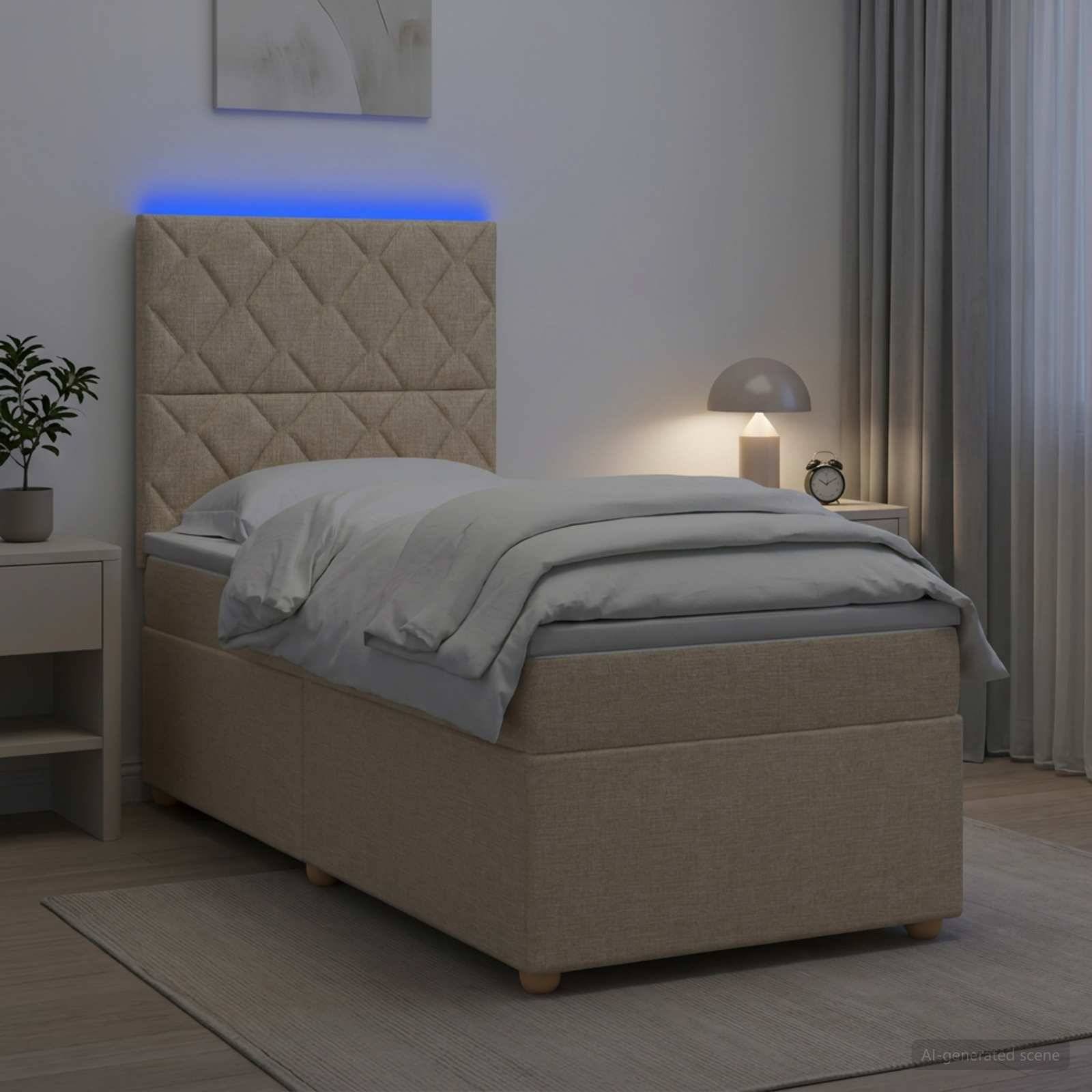 Modernes gepolstertes Einzelbett in einem minimalistischen Schlafzimmer, mit beleuchtetem Kopfteil, grauer Bettwäsche, Nachttischlampe und Nachttisch.