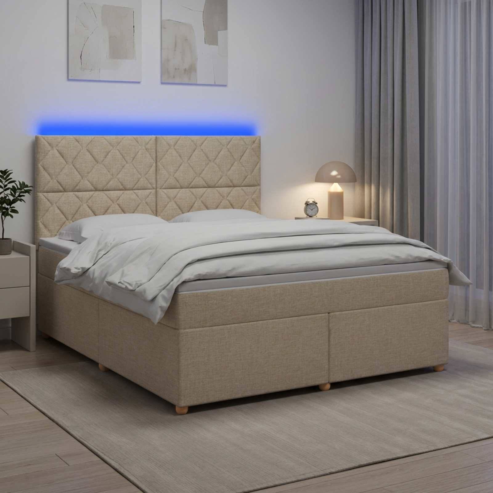 Modernes Schlafzimmer mit beigem gepolstertem Bett, weißer Bettwäsche, blauer LED-Kopfteilakzentuierung, Nachttischlampe, Vorhängen und gerahmten Wandbildern.