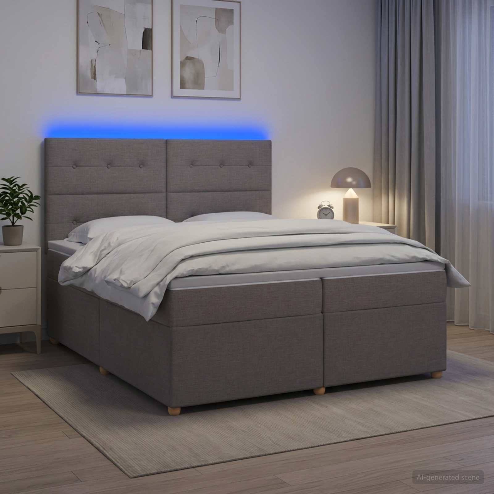 Modernes Schlafzimmer mit einem grau gepolsterten Bett, weißer Bettwäsche, blauer LED-Kopfleuchtleiste, Nachttischlampe, Pflanze und gerahmter Wandkunst.