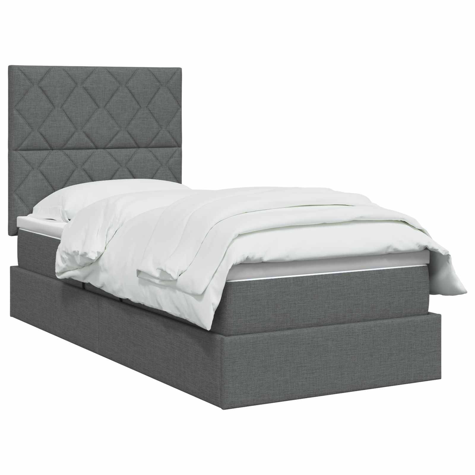 Grau gepolstertes Bett mit diamantgestepptem Kopfteil und weißer Bettwäsche auf einfachem weißem Hintergrund.