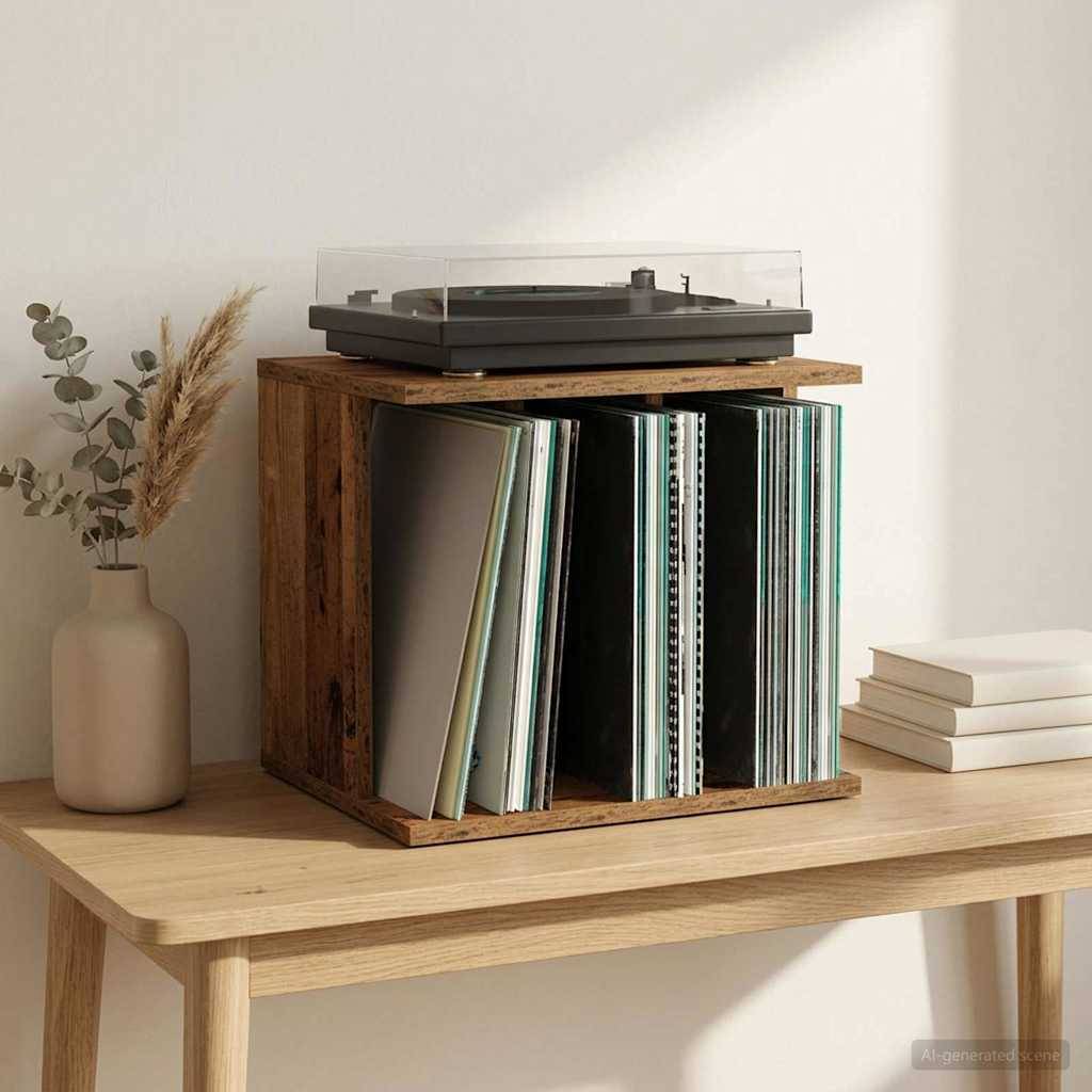 Holzkiste zur Schallplattenlagerung auf einem Tisch, die Schallplatten enthält, mit einem Plattenspieler oben darauf; Vase mit getrockneten Stängeln und gestapelten Büchern in der Nähe.