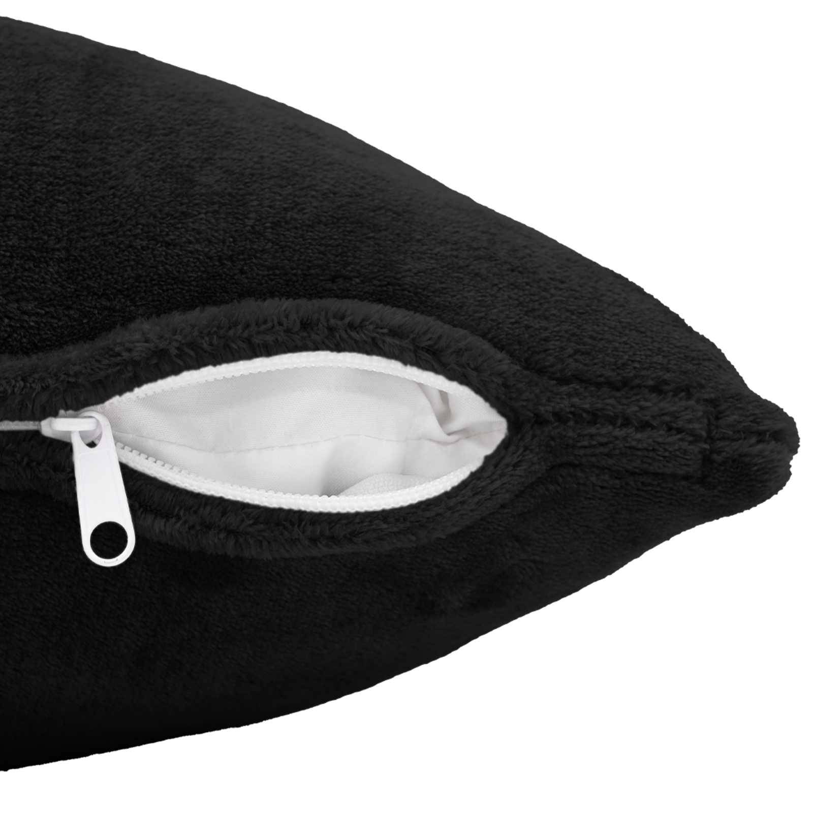 Nahaufnahme eines schwarzen Plüschkissens oder einer schwarzen Plüschdecke mit einem weißen Reißverschluss, der die innere Auskleidung offenbart.