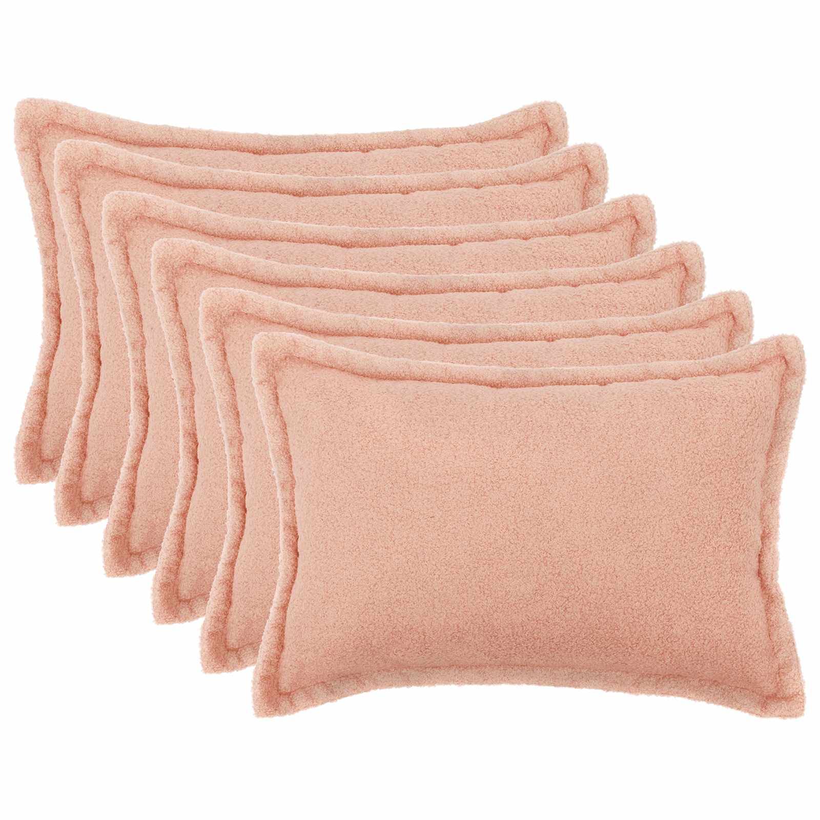 Stapel aus sechs rosa rechteckigen Kissen- oder Polstereinsätzen auf weißem Hintergrund.