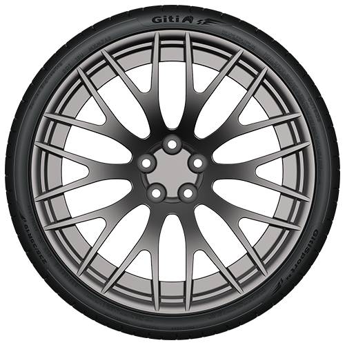Nahaufnahme eines schwarzen Autoreifens mit einer silbernen Mehrspeichen-Leichtmetallfelge auf schwarzem Hintergrund.