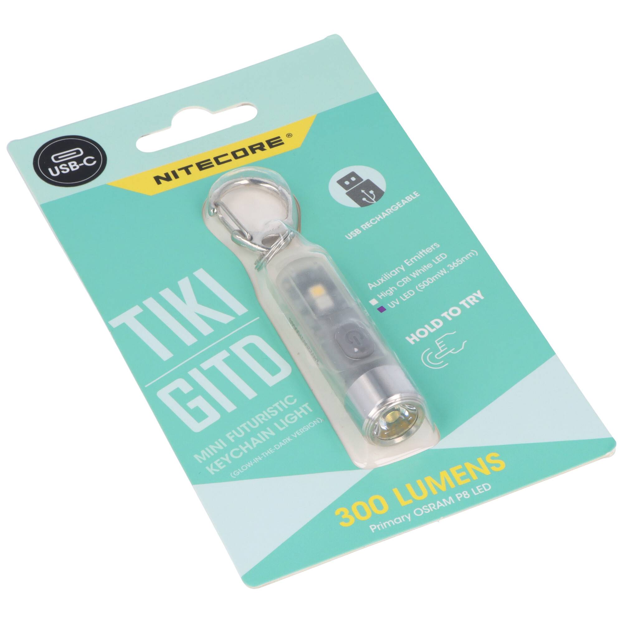 Einzelhandelsverpackung für eine Nitecore TIKI BTO USB-C Schlüsselbund-Taschenlampe, mit der Lampe in Blisterverpackung und „300 Lumen