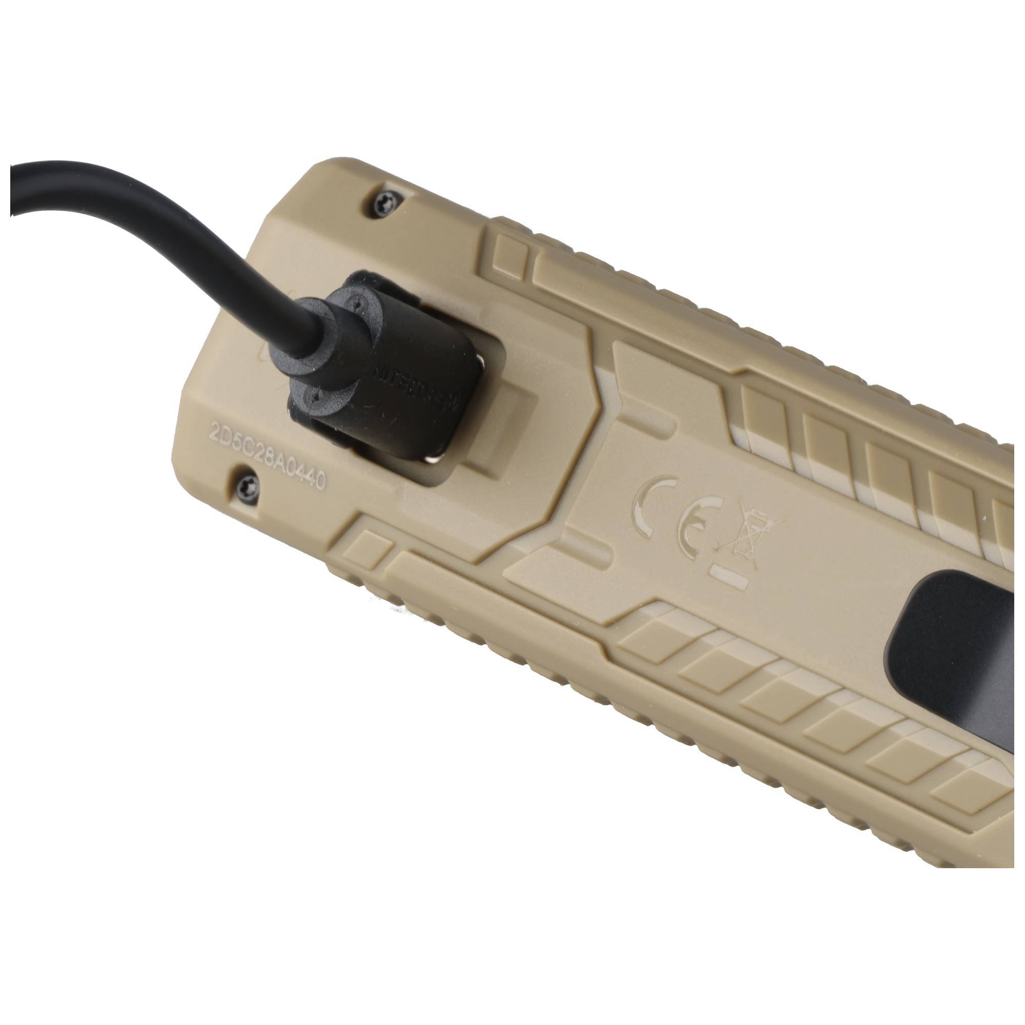Nahaufnahme eines beige-farbenen robusten elektronischen Geräts mit einem schwarzen Kabel, das in ein Ende eingesteckt ist.