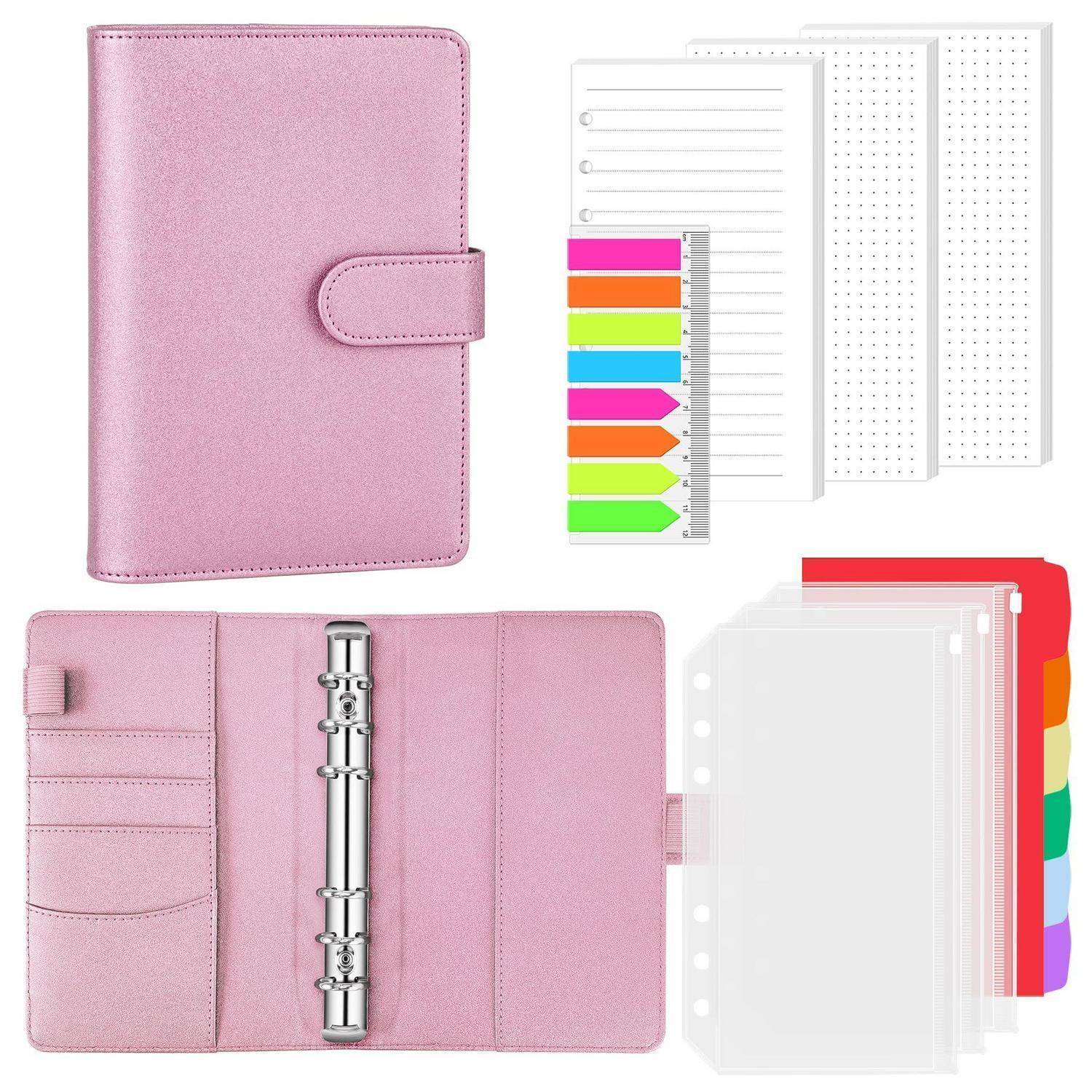 Rosa Ringbinder Planer Organizer mit linierten und gepunkteten Einlagen, farbigen Reitern und durchsichtigen Taschen-Trennblättern, offen und geschlossen dargestellt.