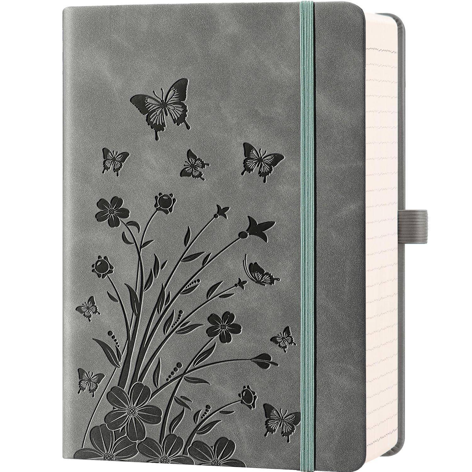Grauer Hardcover-Notizbuch mit Schmetterings- und Blumendesign, blaugrünem Gummiband und sichtbaren linierten Seiten.