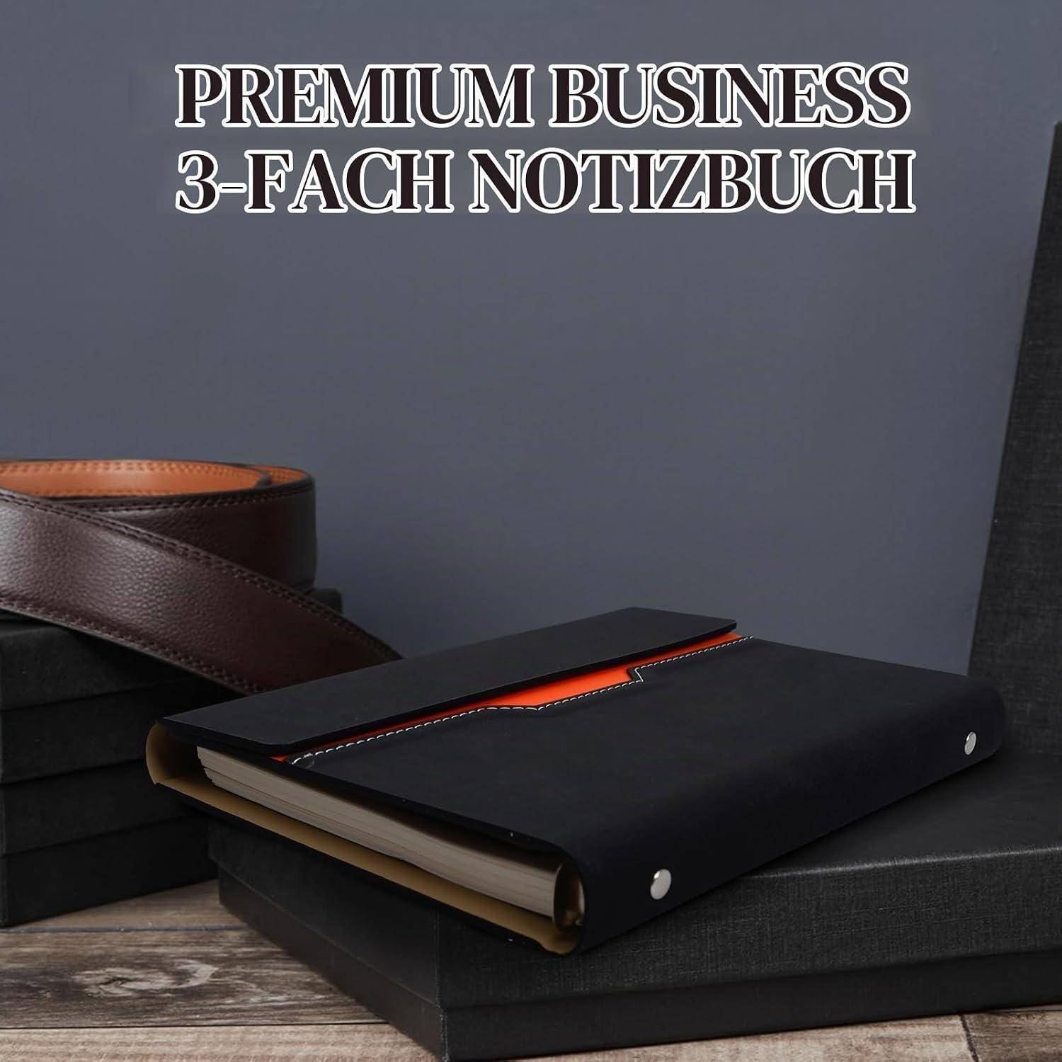 Produktfoto eines schwarzen Premium-Business 3-teiligen Notizbuchset mit Ledergurt und oranger Akzentuierung auf gestapelten Kartons