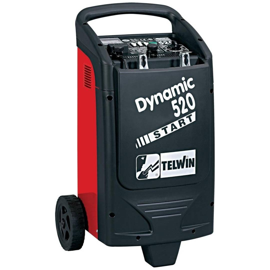 Tragbares TELWIN Dynamic 520 START Batterieladegerät auf Rädern, schwarz und rot mit oberem Griff und vorderer Bedienblende.