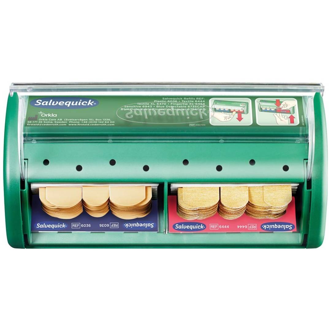 Grüner Salequick-Keksausgeber mit zwei Fächern für runde Sandwich-Kekse und Anweisungsetiketten oben.