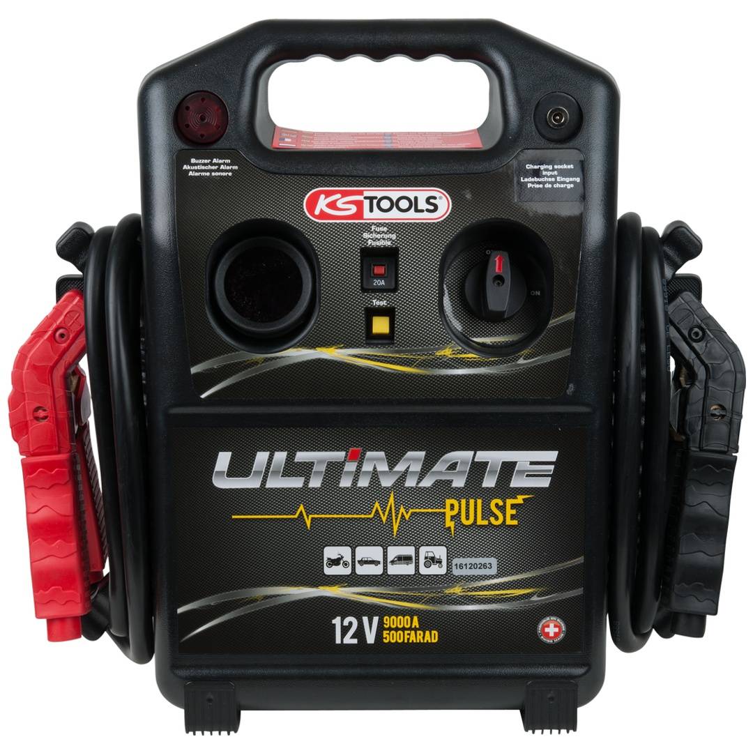 Tragbares KS Tools Ultimate Pulse 12V Starthilfegerät mit integriertem Licht und roten/schwarzen Klemmen an den Seiten.