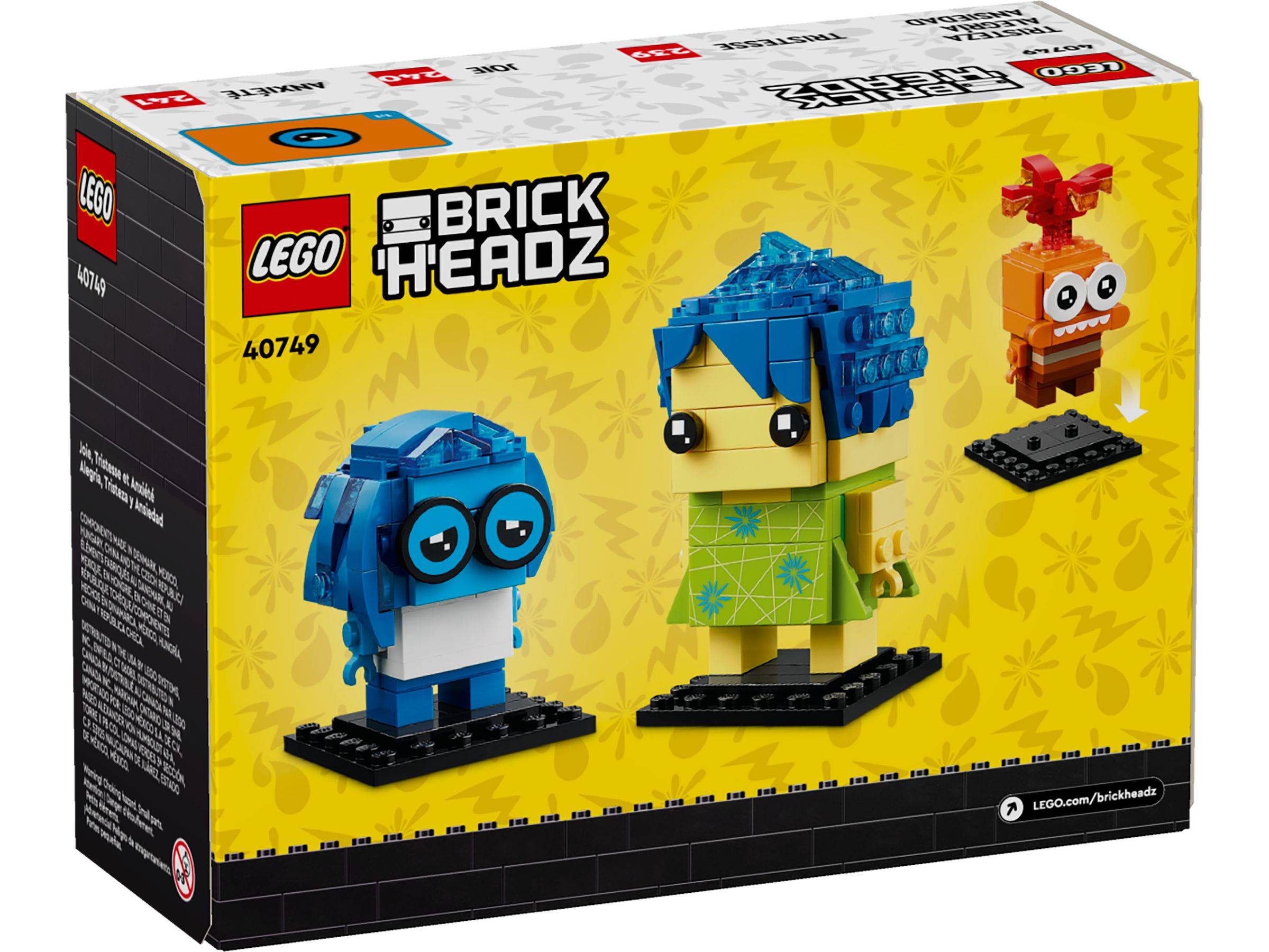 LEGO BrickHeadz Set-Box mit drei baubaren Figuren: zwei blauharige Figuren und eine kleine orangefarbene Figur mit einer roten Schleife auf schwarzen Ausstellungsständern.