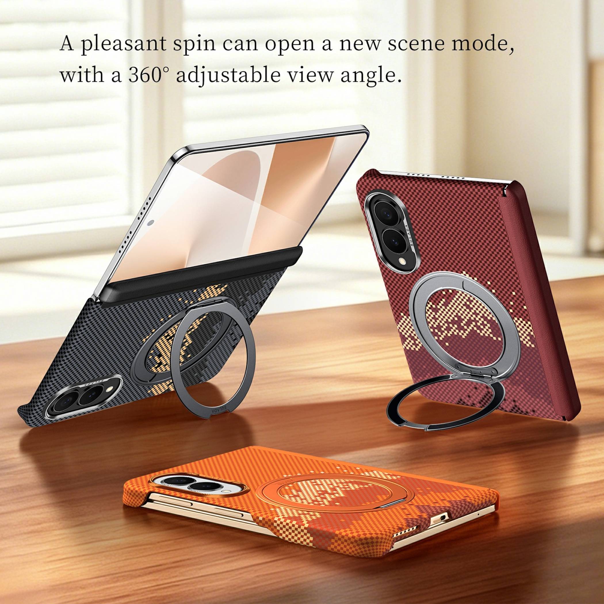 Drei Smartphone-Hüllen mit integrierten Ringständern in Schwarz, Rot und Orange, eine aufrecht gestützt, um die um 360° verstellbaren Betrachtungswinkel hervorzuheben.