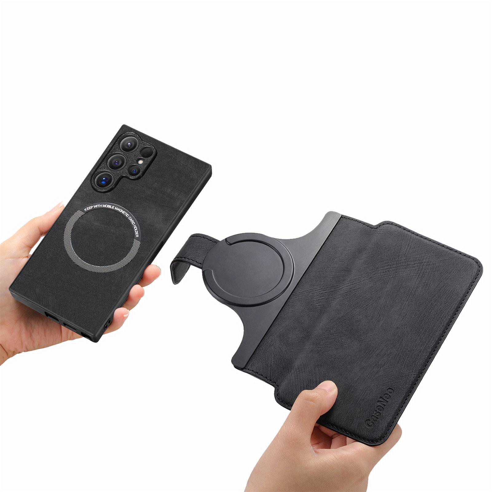 Hände, die ein schwarzes Handygehäuse und eine passende Brieftasche mit Klappfunktion mit einem kreisförmigen Magnetring zeigen, offen auf weißem Hintergrund angezeigt.
