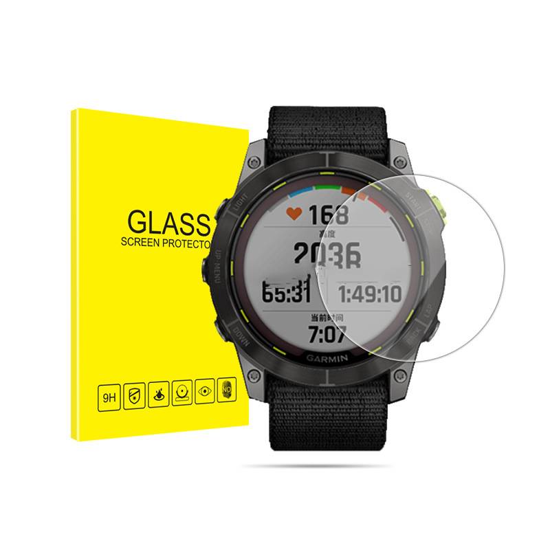 Garmin-Smartwatch mit einer klaren kreisrunden Displayschutzfolie neben einer gelben Packung 