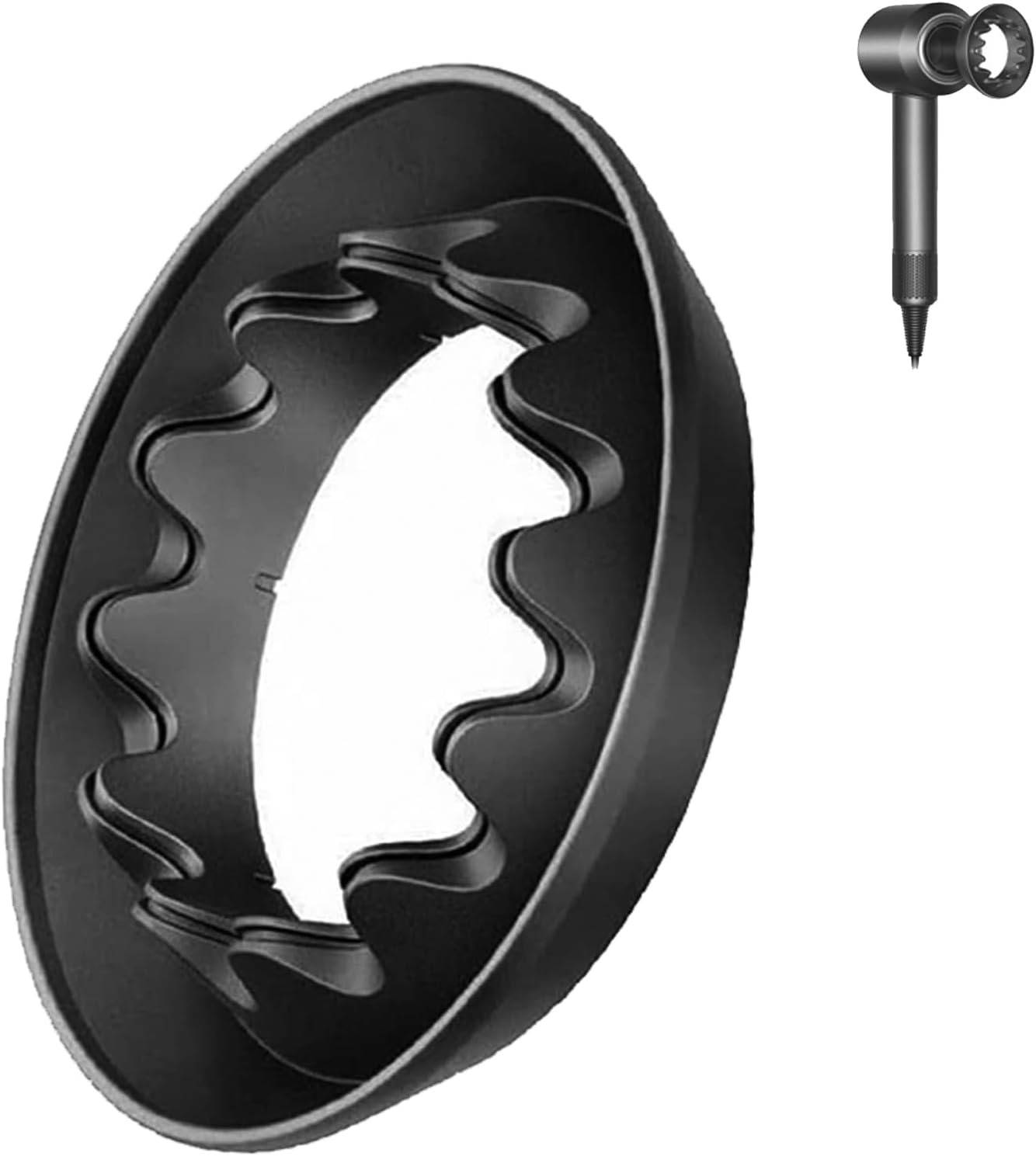 Schwarzer ovaler Luftaufsatz-Diffusor mit wellenförmigen inneren Rippen, dargestellt mit einem kleinen Düsenadapter-Einsatz oben rechts.