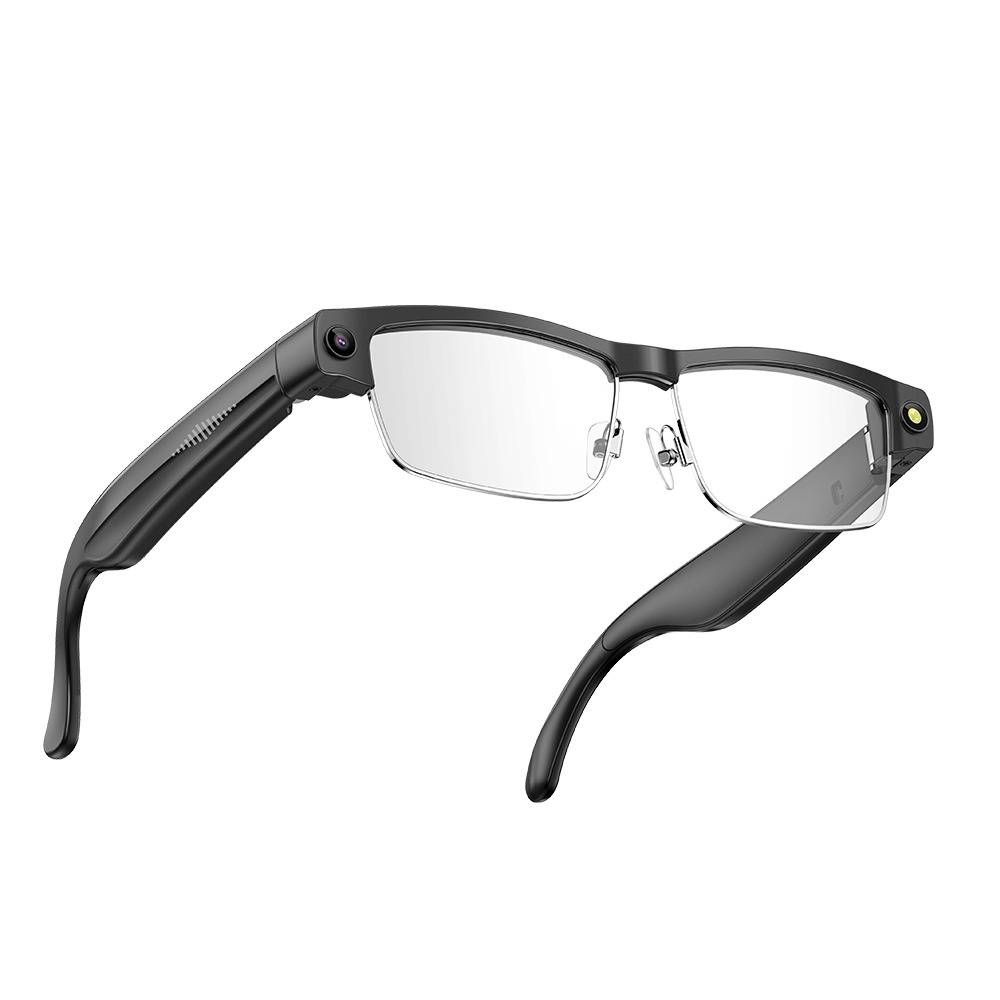 Schwarze intelligente Brille mit klaren Gläsern und seitlich angebrachten Kamerasensoren auf weißem Hintergrund.