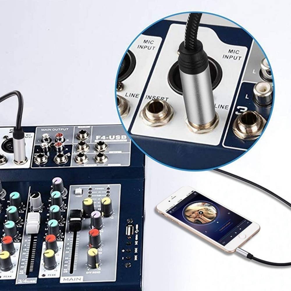 Audio-Mixer mit eingestecktem Kabel, das mit einem Smartphone verbunden ist, gezeigt mit einer Nahaufnahme der Mikrofoneingang- und Line-Insert-Anschlüsse.