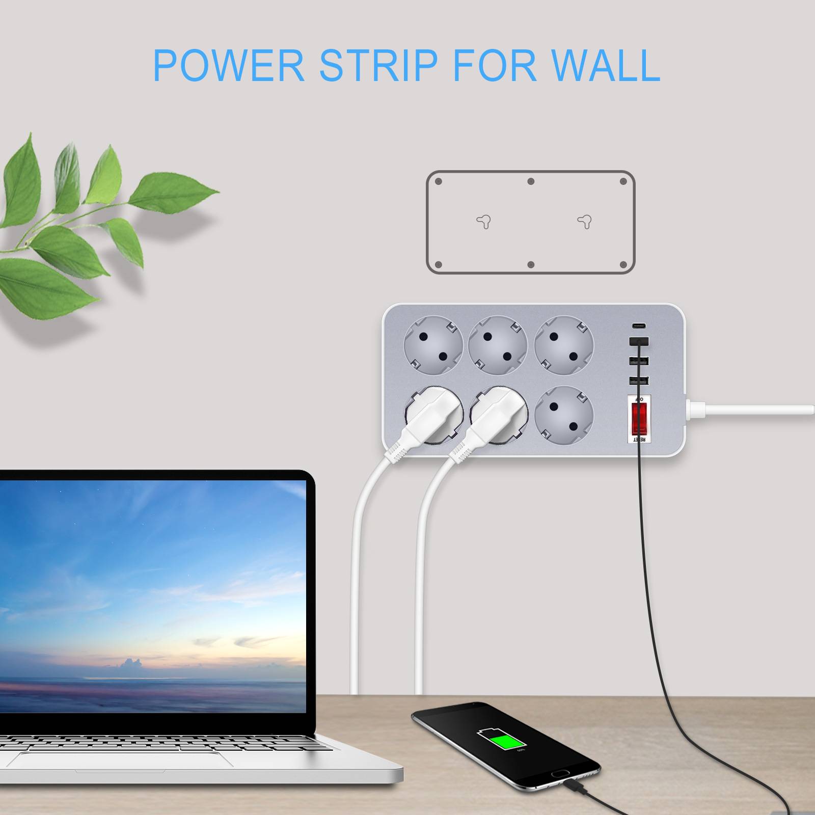 Wandmontierte Steckerleiste mit der Bezeichnung „STECKERLEISTE FÜR WAND" mit mehreren genutzten Steckdosen, die einen Laptop und ein Telefon auf einem Schreibtisch auflädt.