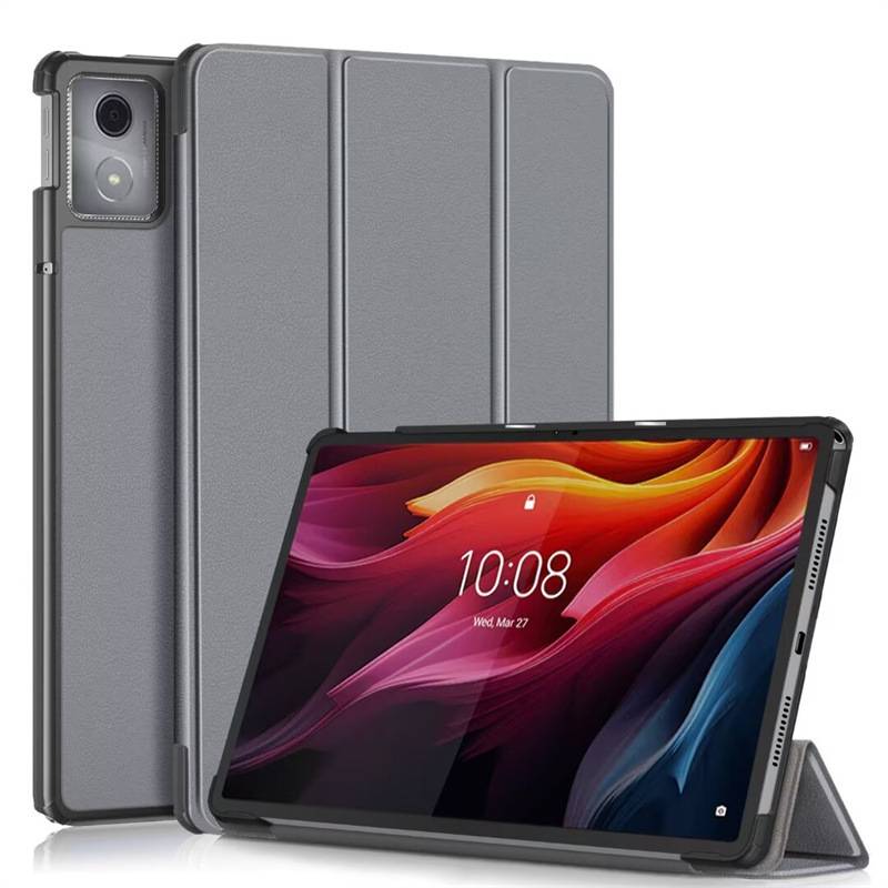 Tablet in einem grauen Folio-Etui mit integriertem Ständer, geöffnet und aufgestellt neben einem Telefon in einer passenden Schutzhülle.