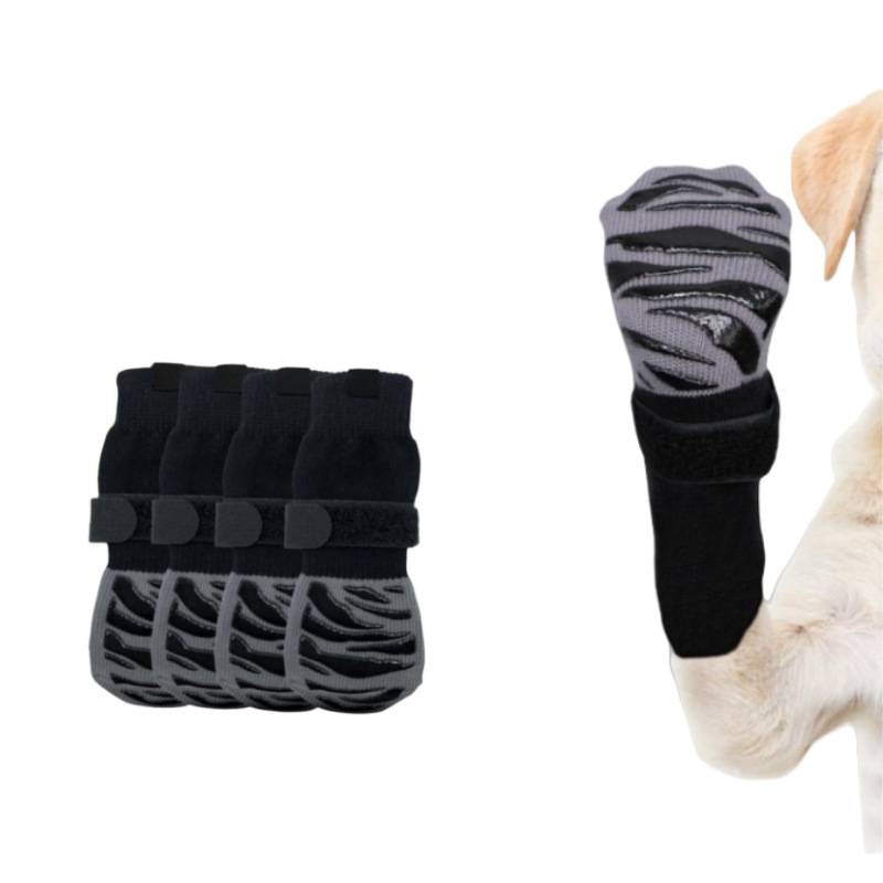 Hundepfoten-Schutzstiefel mit rutschfester Sohle, gezeigt neben einem Hund, der den passenden Schutzstiefel an seinem Vorderbein trägt.