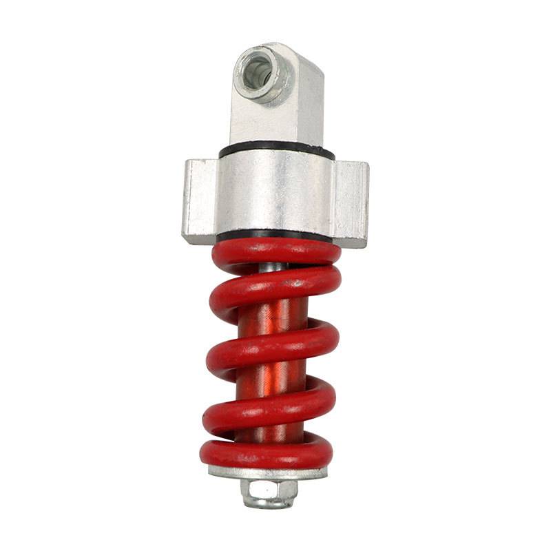 Rote Spiralfeder-Stoßdämpfer mit Metallhalterungen oben und unten auf weißem Hintergrund.