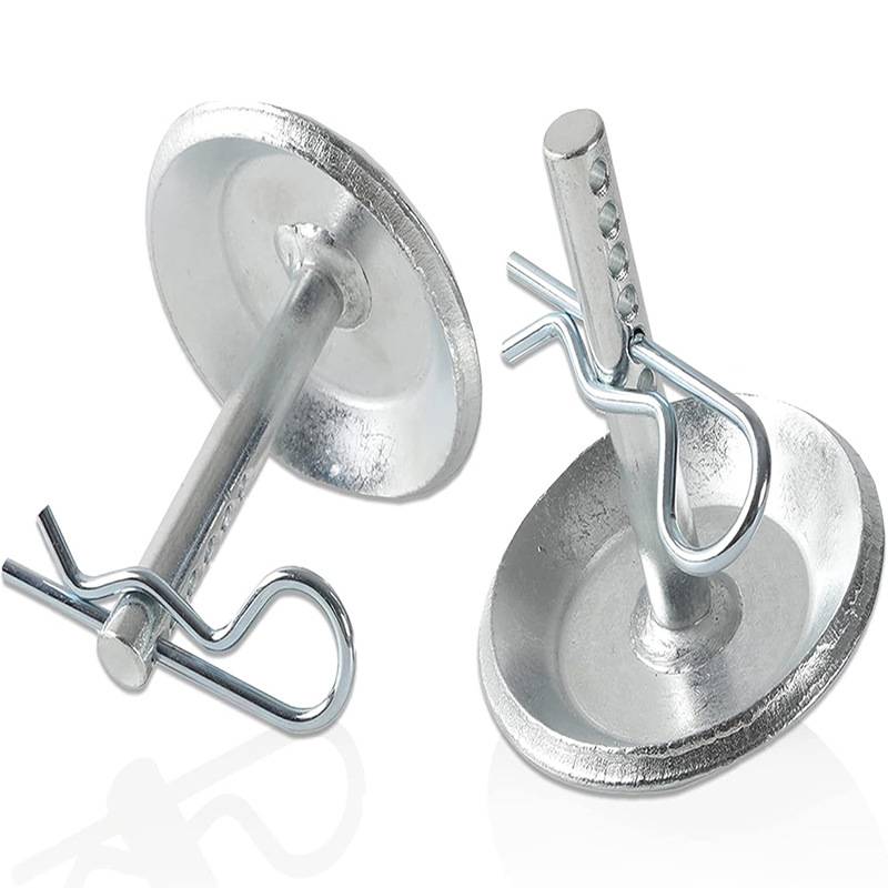 Zwei Metallsaugnäpfe mit Federclips auf weißem Hintergrund.