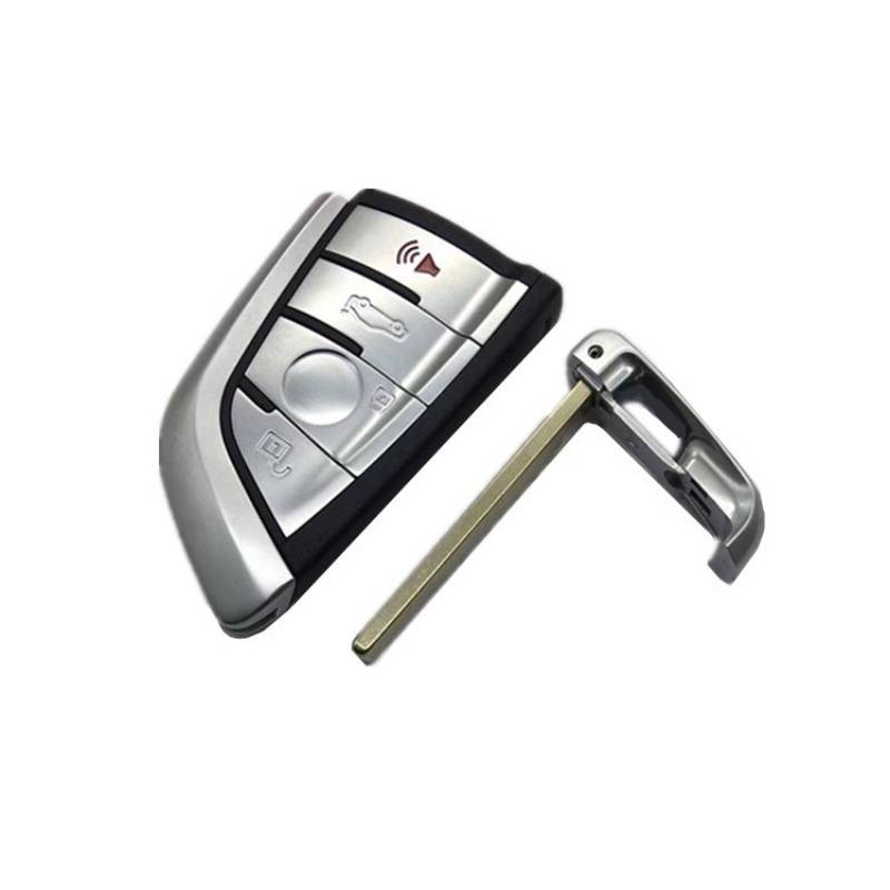Automobil-Smartkey mit eingebautem Notfall-Schlüsselblatt, abgebildet neben dem Schlüsselanhänger.