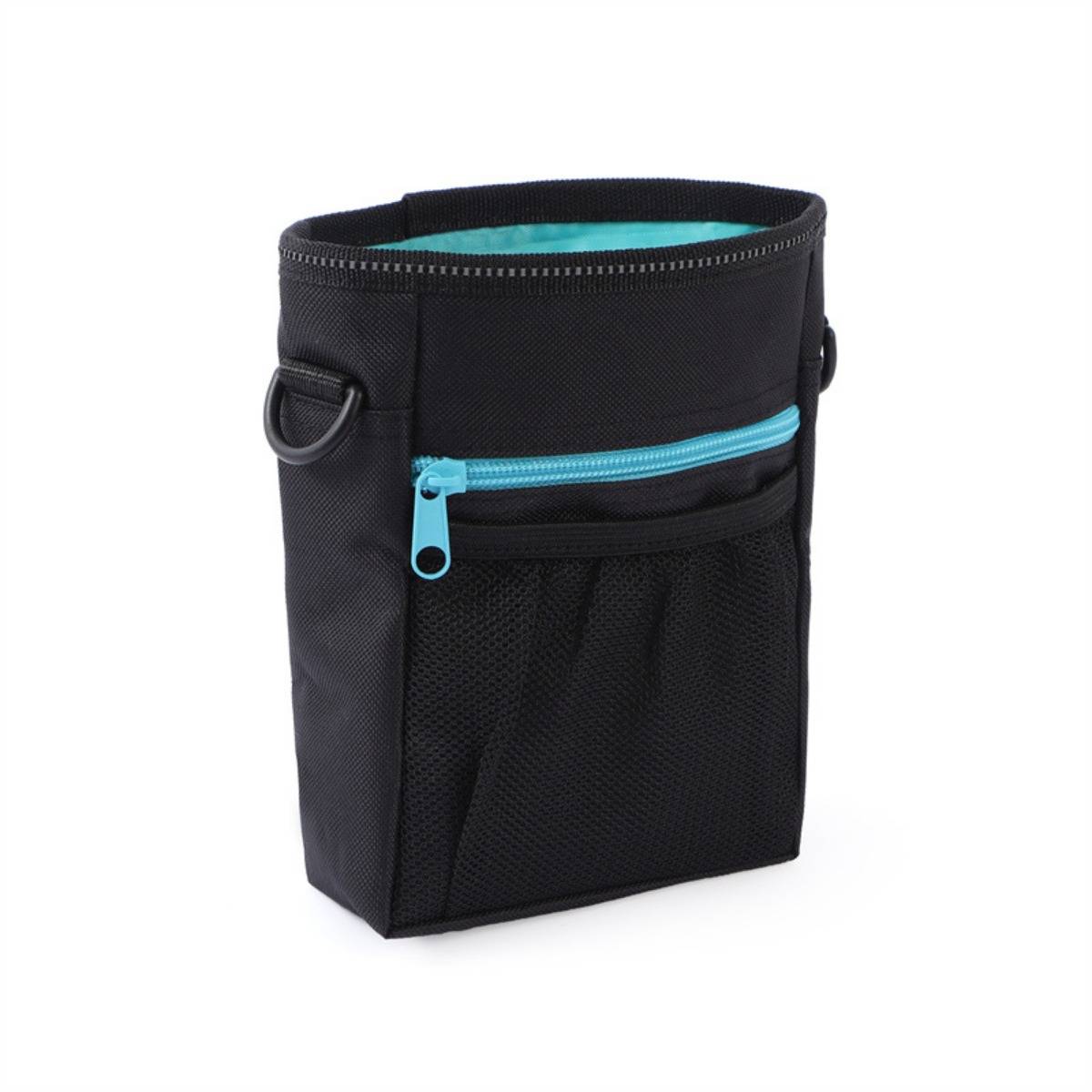 Schwarze zylindrische Tasche mit türkisfarbenem Reißverschluss und Besatz, gezeigt auf weißem Hintergrund.