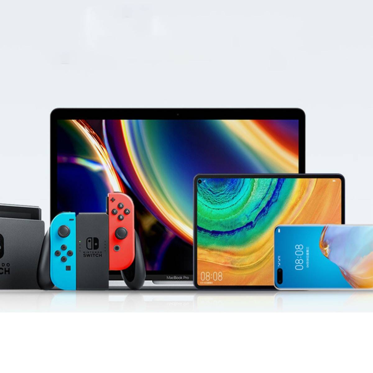 Eine Anordnung von Unterhaltungselektronik: ein Laptop, Tablet, Smartphone, Nintendo Switch mit Controllern und eine Smartwatch, gezeigt auf weißem Hintergrund.