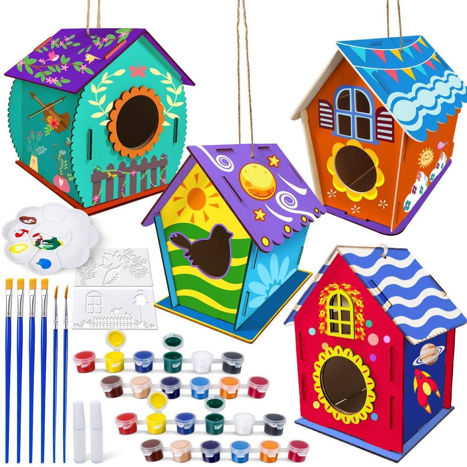 Vier farbenfrohe Vogelhausmodelle verziert mit Farbe, Pinseln, Palette und Farbdosen für ein Handwerk-Malset.