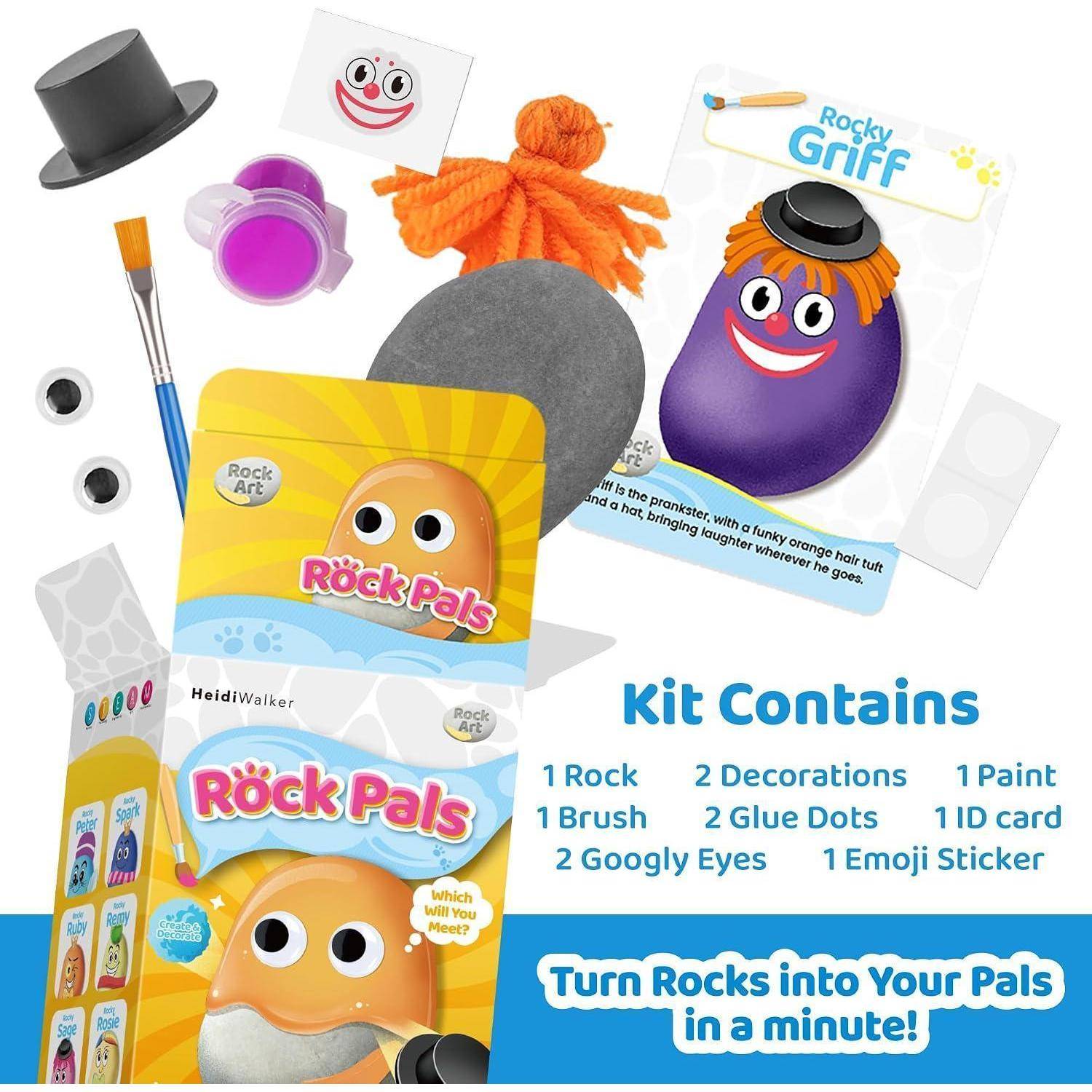 Rock Pals Bastelset Verpackung und Inhalt, zeigt dekorierte Steinfiguren, Pinsel, Farbe, Wackelaugen, Klebepunkte, Emoji-Aufkleber und Anleitung.