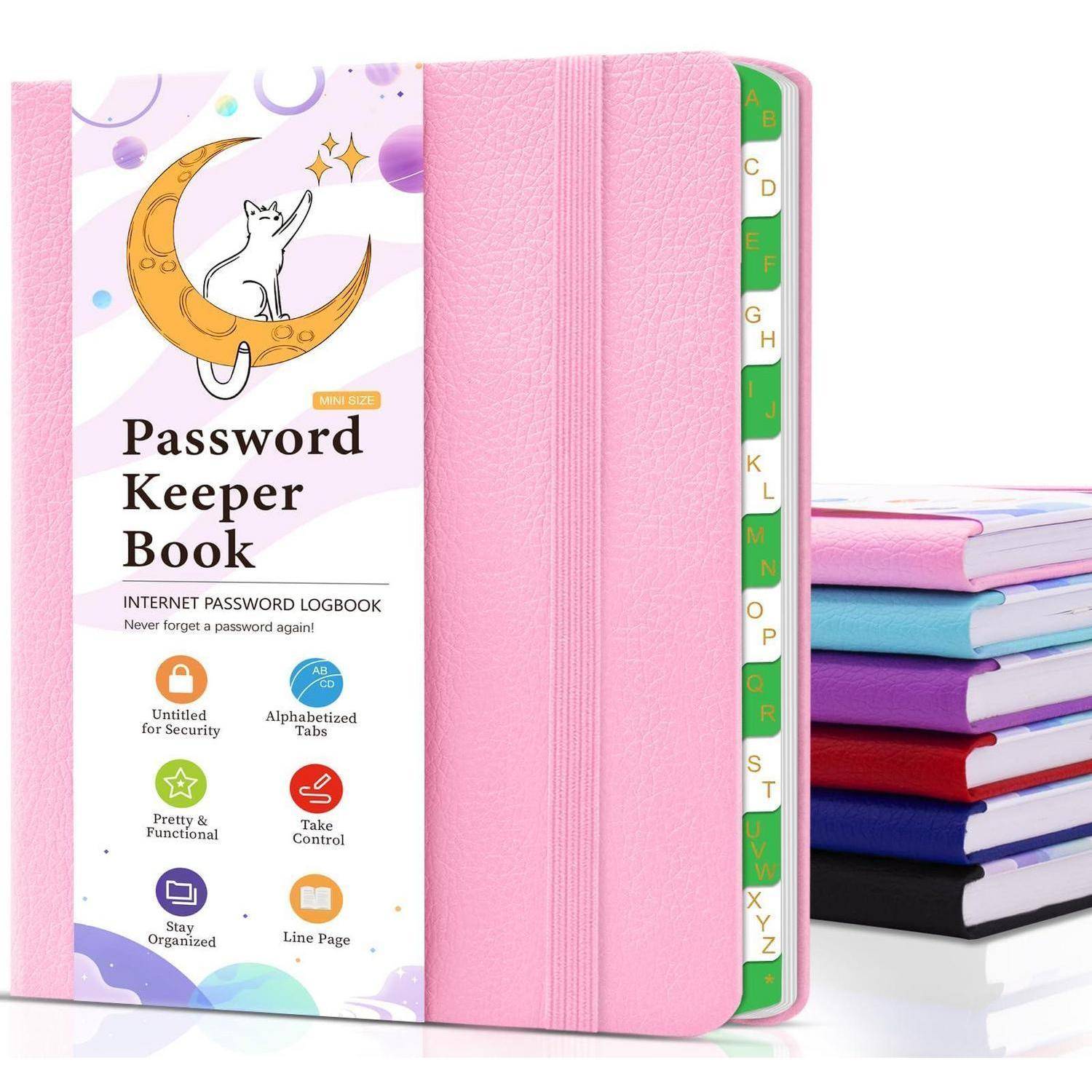 Rosa Kunstleder-Passwortbuch mit alphabetisierten Registerkarten, geschlossen neben einem Stapel farbiger Bücher dargestellt; der Umschlag trägt die Aufschrift „Password Keeper Book