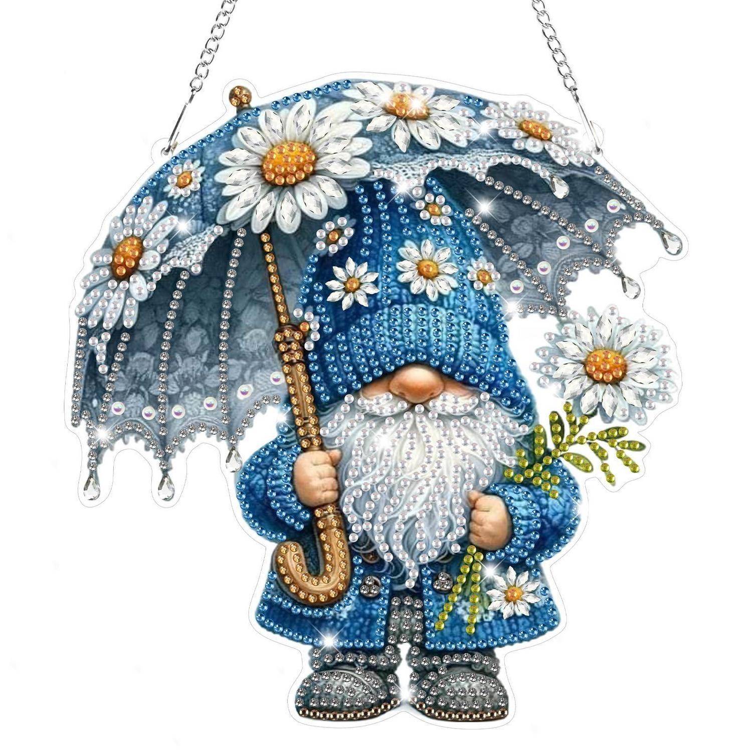Dekorativer Gnom-Schmuck, der einen Blumenschirm hält, trägt einen blauen Hut und Mantel mit weißem Bart und Blumenakzenten.