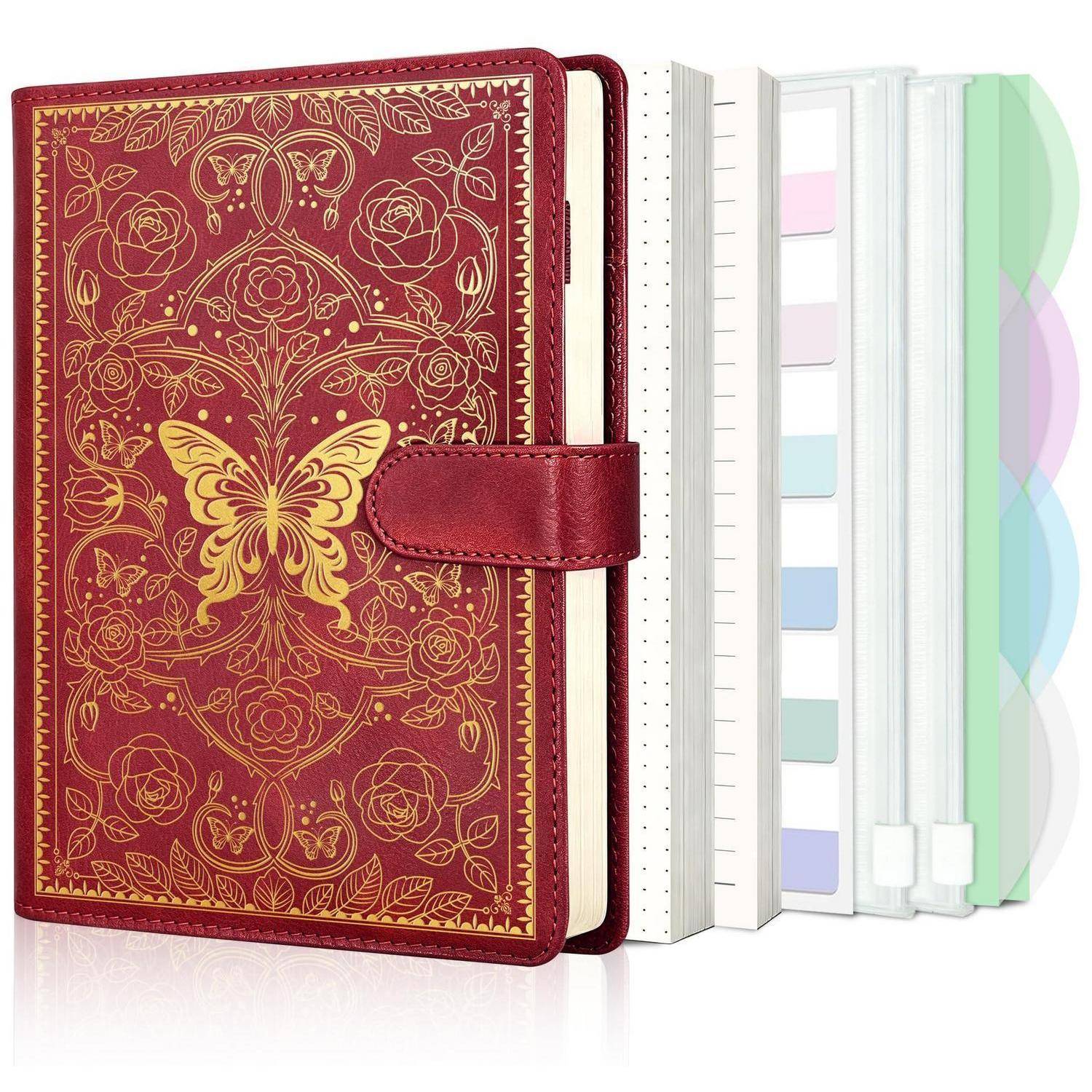 Dekorativer roter Lederplaner oder Organizer mit goldenem floralem Schmetterlingsdesign, aufgeklappt mit Registerblättern und Pastelleinlagen dargestellt.
