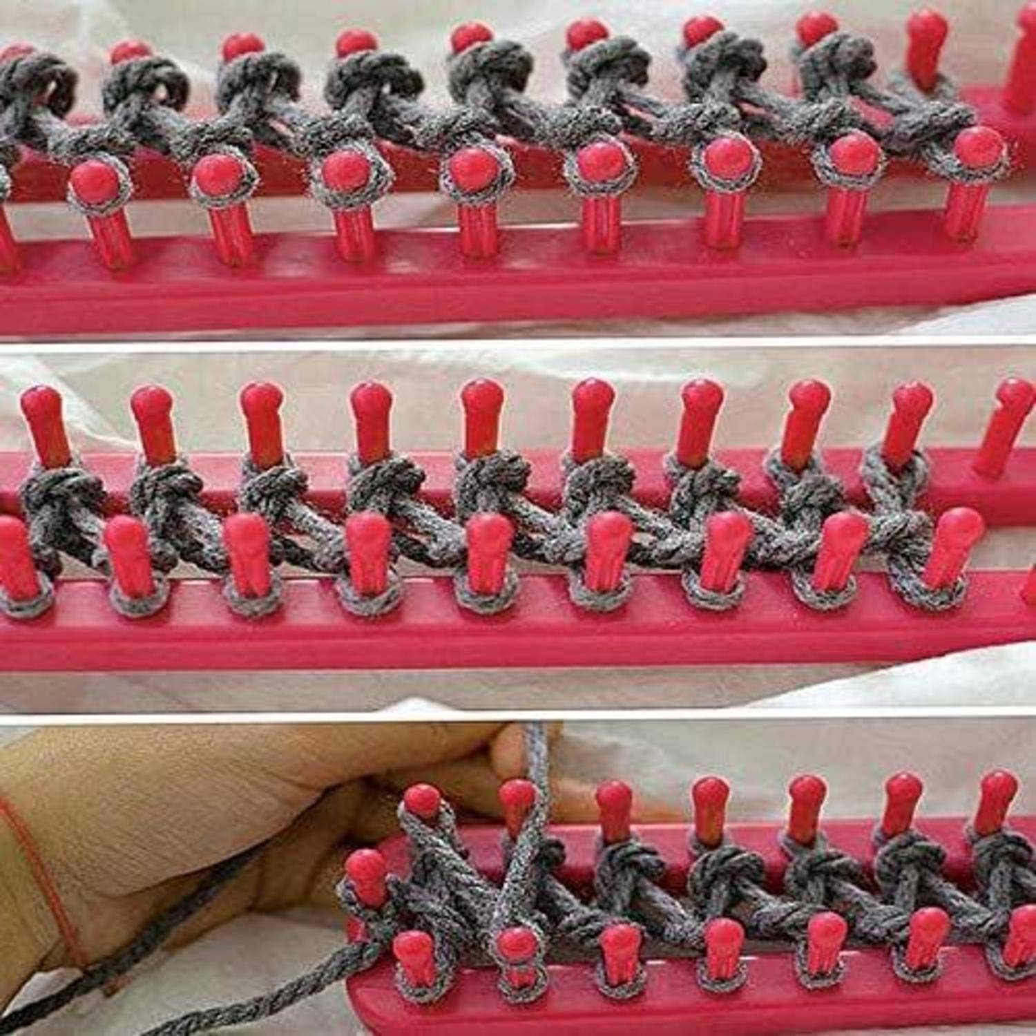 Nahaufnahme eines Strickrahmens mit grauem Garn, das auf roten Stiften verwoben ist, während eine Hand die laufende Arbeit leitet.
