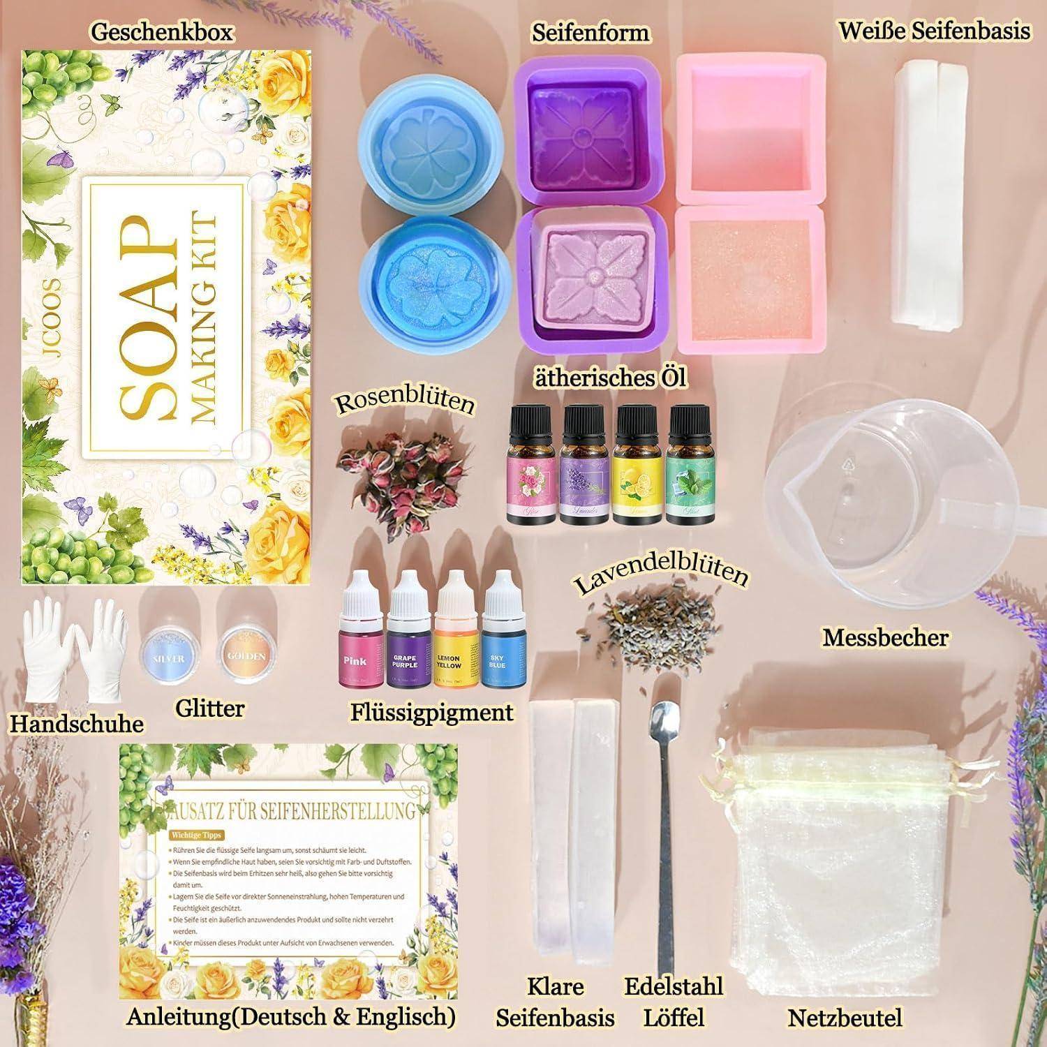 Seifenherstellungsset mit Geschenkbox, Seifenbasis, Formen, Öle, Pigmente, Blumen, Werkzeuge, Handschuhe, Messbechern, Netzbeutel und deutschen/englischen Anweisungen.