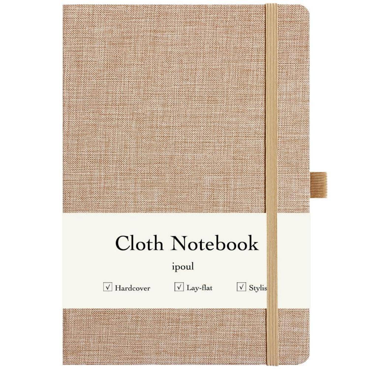 Beigefarbenes Stoff-Hardcover-Notizbuch mit Gummiband; Etikett auf dem Umschlag trägt die Aufschrift „Cloth Notebook