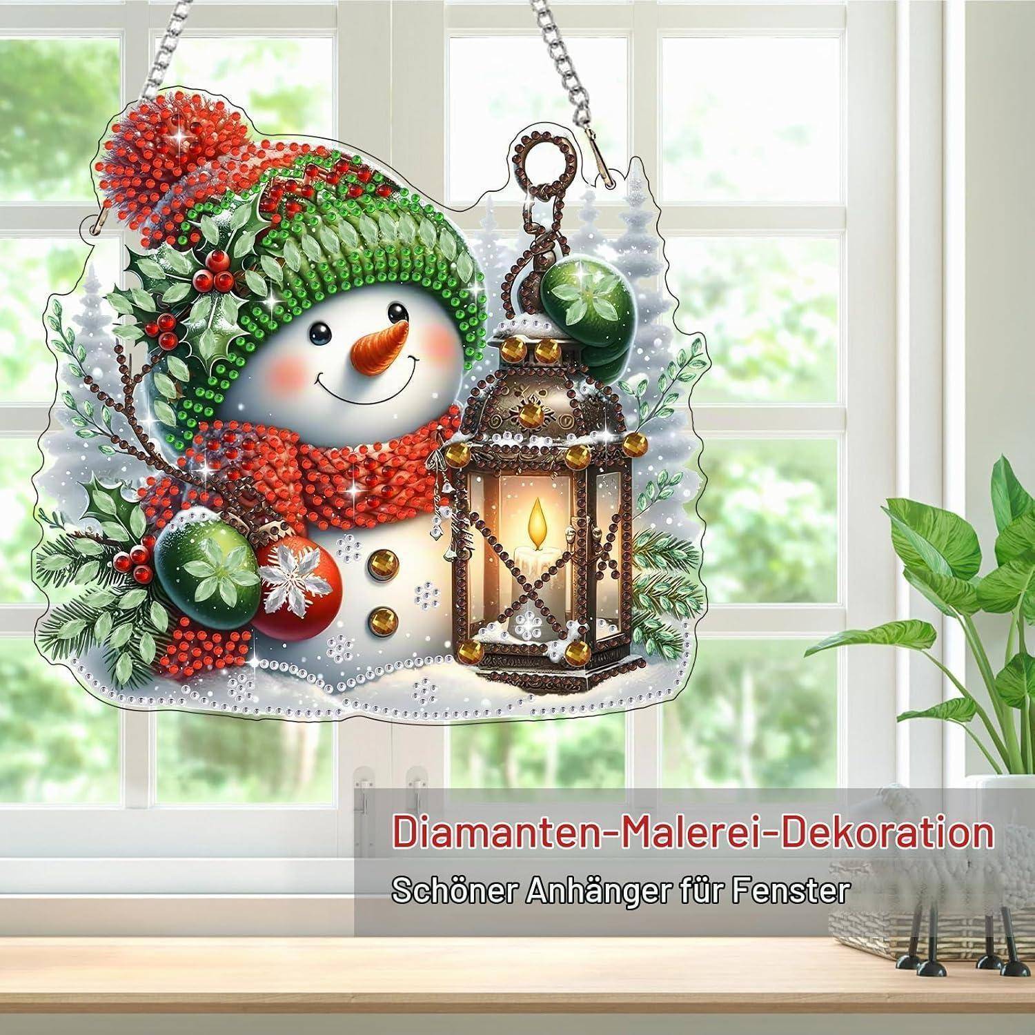 Weihnachtsfensterdekoration mit einem lächelnden Schneemann, einer Laterne und dem Text „Diamanten-Malerei-Dekoration
