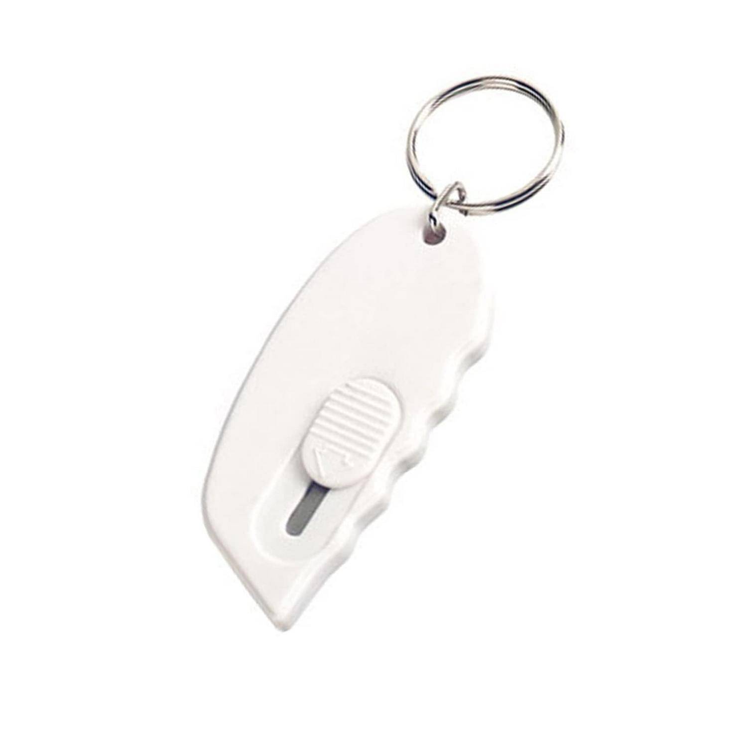 Weiße Kunststoff-Schlüsselanhänger-Signalpfeife mit Schiebeschalter, auf einfachem weißen Hintergrund dargestellt.
