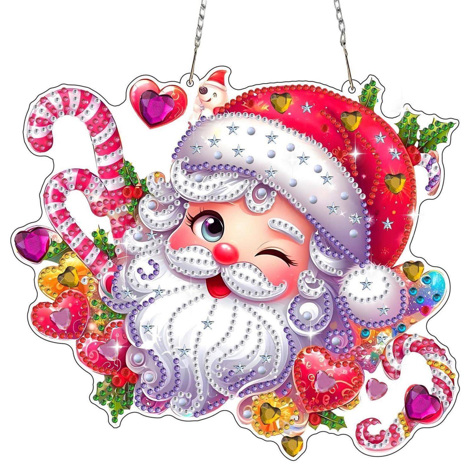 Verspielter Weihnachtsmann-Schmuck mit Zuckerstangen, Herzen und mit Juwelen besetzten roten, rosa und violetten Verzierungen, der an einer Kette hängt.